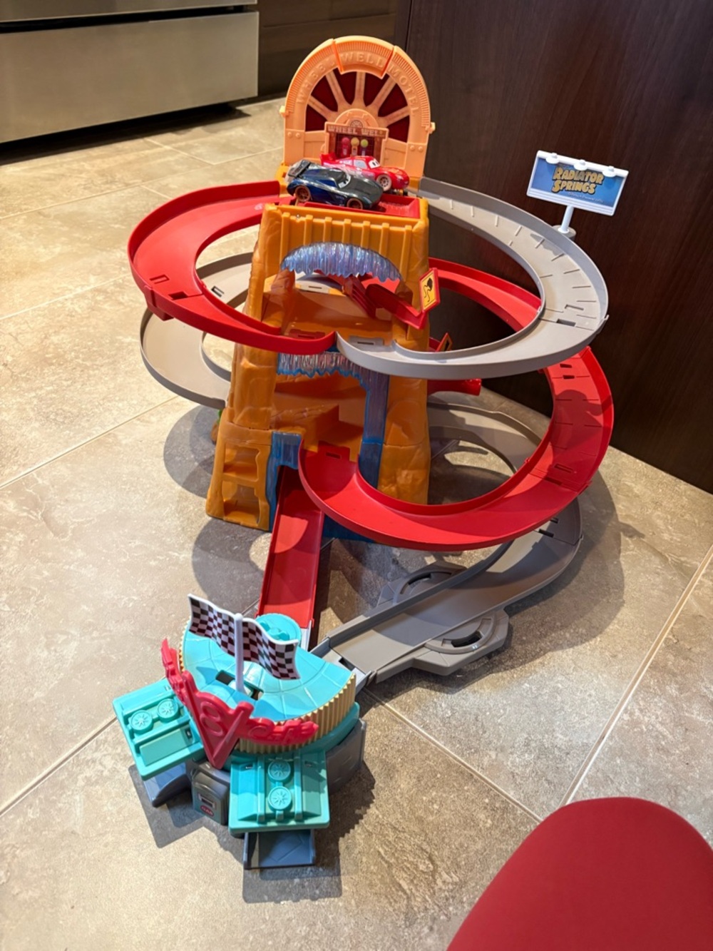 Disney Spiral Race Track Playset in Red, Gray, Teal, Orange